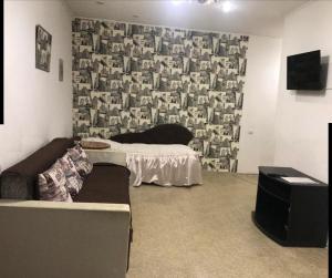 TV a/nebo společenská místnost v ubytování Shevchenka Guest House от 600гр 1-2-3к квартири 096-55-48-111 біля Академії