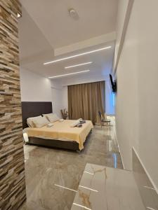 Postel nebo postele na pokoji v ubytování Casa Blue Sarantis + 164 fotografií