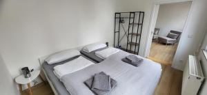 Voodi või voodid majutusasutuse mein Heimquartier - Ferienwohnung im historischen Fachwerkhaus mit Terrasse in Waiblingen toas