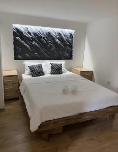 Postel nebo postele na pokoji v ubytování Vino&Vista + 27 fotografií