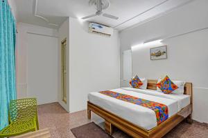 Postel nebo postele na pokoji v ubytování FabHotel Casa Residency + 19 fotografií