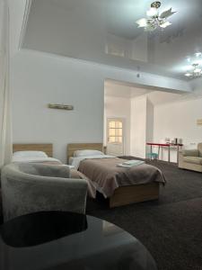 Postel nebo postele na pokoji v ubytování NoirHotel