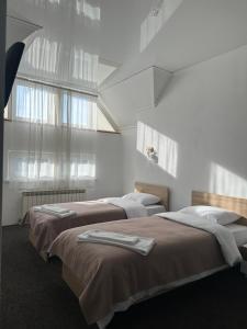 Postel nebo postele na pokoji v ubytování NoirHotel + 47 fotografií