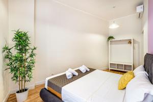 Postel nebo postele na pokoji v ubytování Rome Aparts