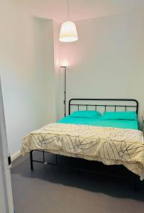 Ένα ή περισσότερα κρεβάτια σε δωμάτιο στο Chambre Roubaix