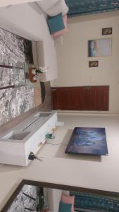 Φωτογραφία από το άλμπουμ του 24B Louieville apartment σε Lusaka