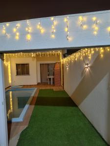 Πισίνα στο ή κοντά στο Casa Pé na Areia Arembepe Pirui