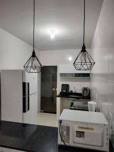 Η κουζίνα ή μικρή κουζίνα στο Casa Pé na Areia Arembepe Pirui