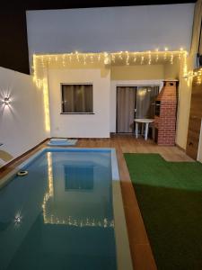 Πισίνα στο ή κοντά στο Casa Pé na Areia Arembepe Pirui