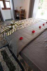 Postel nebo postele na pokoji v ubytování Taprobana Island Bliss