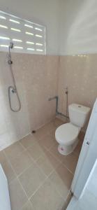 a bathroom with a toilet and a shower at Khao Ban Eings in Sena +20 photos