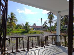 Balkón nebo terasa v ubytování Echah's Homestay-mslim only