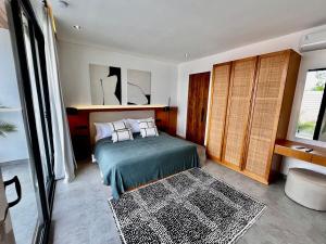 En eller flere senge i et værelse på Apartment Wati 4 Umalas