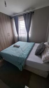 Ένα ή περισσότερα κρεβάτια σε δωμάτιο στο Fayhomes