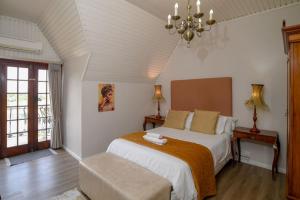 Postel nebo postele na pokoji v ubytování Dark Chocolate Guest House + 33 fotografií