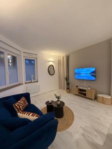 Et tv og/eller underholdning på Casa Verde - T4, Proche plage