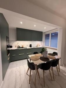 Køkken eller tekøkken på Casa Verde - T4, Proche plage