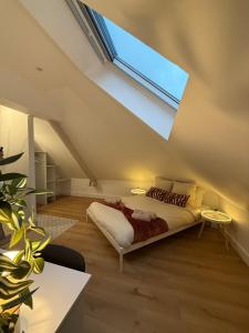 En eller flere senge i et værelse på Casa Verde - T4, Proche plage