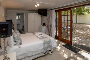 Kuchyň nebo kuchyňský kout v ubytování Dark Chocolate Guest House