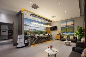 Μια τηλεόραση ή/και κέντρο ψυχαγωγίας στο Qiuguo Hotel Beijing New International Expo Centre