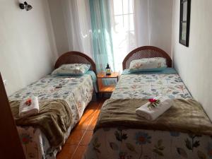 Ένα ή περισσότερα κρεβάτια σε δωμάτιο στο La bodega de Jorge