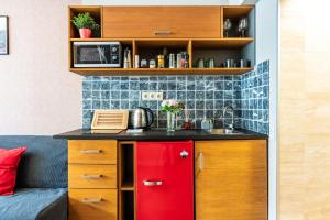 Køkken eller tekøkken på Central stylish apartment with shared rooftop terrace and jacuzzi MK2