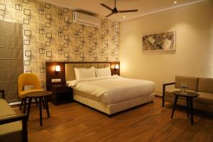 Ένα ή περισσότερα κρεβάτια σε δωμάτιο στο Hotel D Dev +45 φωτογραφίες