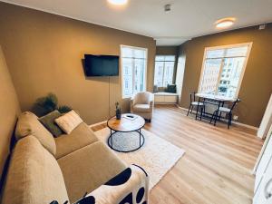 Et tv og/eller underholdning på Barfot Apartment - Bergen City center