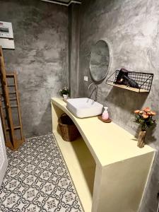 a bathroom with a sink and a mirror at The Summer Cottage Koh Chang in Khlaung Phai Bae +28 photos