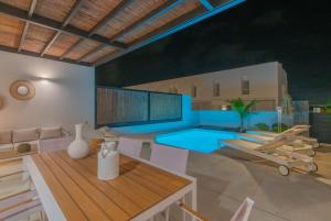 a visualization of a living room with a swimming pool at Villa Serena Blanca by Villalia Luxury Oasis & Private Pool in Playa Blanca