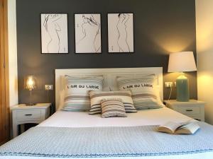 En eller flere senge i et værelse på Villa Esperanza by Villalia