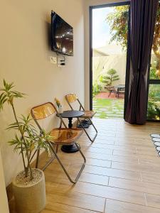 TV a/nebo společenská místnost v ubytování K'TY Homestay Phan Thiết