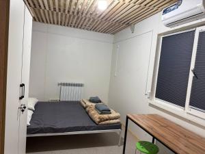 Postel nebo postele na pokoji v ubytování Kushtar + 17 fotografií