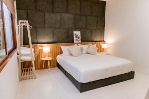 En eller flere senge i et værelse på Holmestay-Best location! Comfort room!