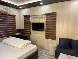 Postel nebo postele na pokoji v ubytování Ta Hayatt + 3 fotografie