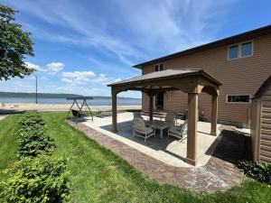 a backyard with a gazebo and a swing at 600 Lakeshore home in Lake City