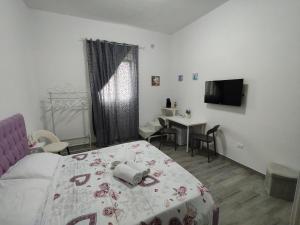 Postel nebo postele na pokoji v ubytování CarpeDiemHouse