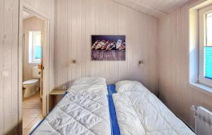 Ένα ή περισσότερα κρεβάτια σε δωμάτιο στο Dünenpark 2C - Dorf 4 +21 φωτογραφίες