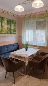 Χώρος καθιστικού στο Margit Apartman +14 φωτογραφίες