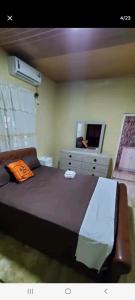 Ένα ή περισσότερα κρεβάτια σε δωμάτιο στο Bobby Vacational Home +4 φωτογραφίες