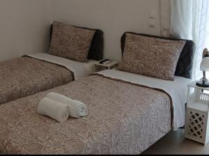 Postel nebo postele na pokoji v ubytování Akrivis studio + 65 fotografií