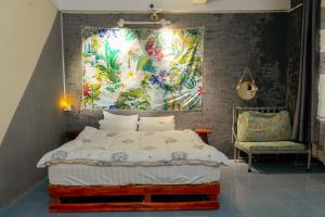 Ένα ή περισσότερα κρεβάτια σε δωμάτιο στο Bụi Hostel - Ferry to Rạch Giá