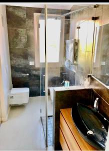 Koupelna v ubytování RIMINI Urban Suite Apartament