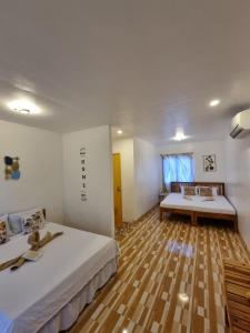 Postel nebo postele na pokoji v ubytování Isla Cove Guest House