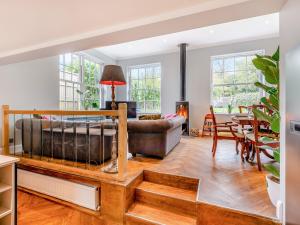 a living room with a couch and a table at Hillside - Uk48202 in Stockbury