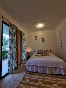 Postel nebo postele na pokoji v ubytování Isla Cove Guest House