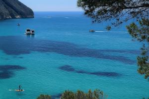 a large body of water with boats in it at Calamora-Moraira in Moraira +56 photos