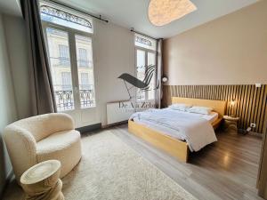 Ένα ή περισσότερα κρεβάτια σε δωμάτιο στο République 5 - Downtown & close to thermal baths