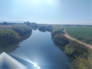 an aerial view of a river next to a field at Casa del Minatore in Donigala Fenughedu +50 photos