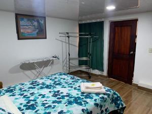 Ένα ή περισσότερα κρεβάτια σε δωμάτιο στο Habitación Céntrica +2 φωτογραφίες